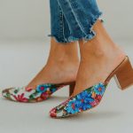 A vibrant and colorful pair of casual mules shoes for women.